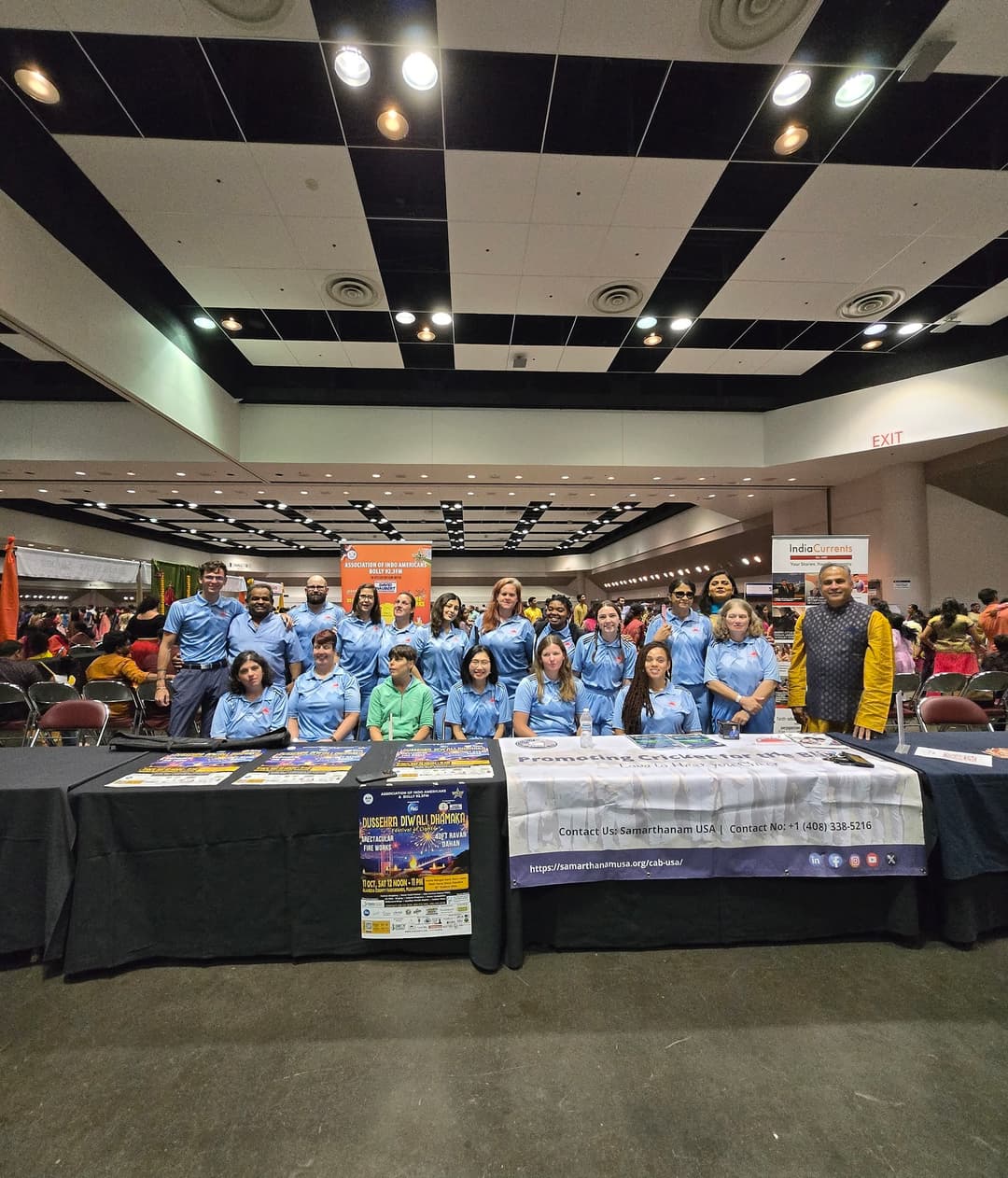 A group photo of the women&#39;s blind cricket team, smiling and enjoying the event.