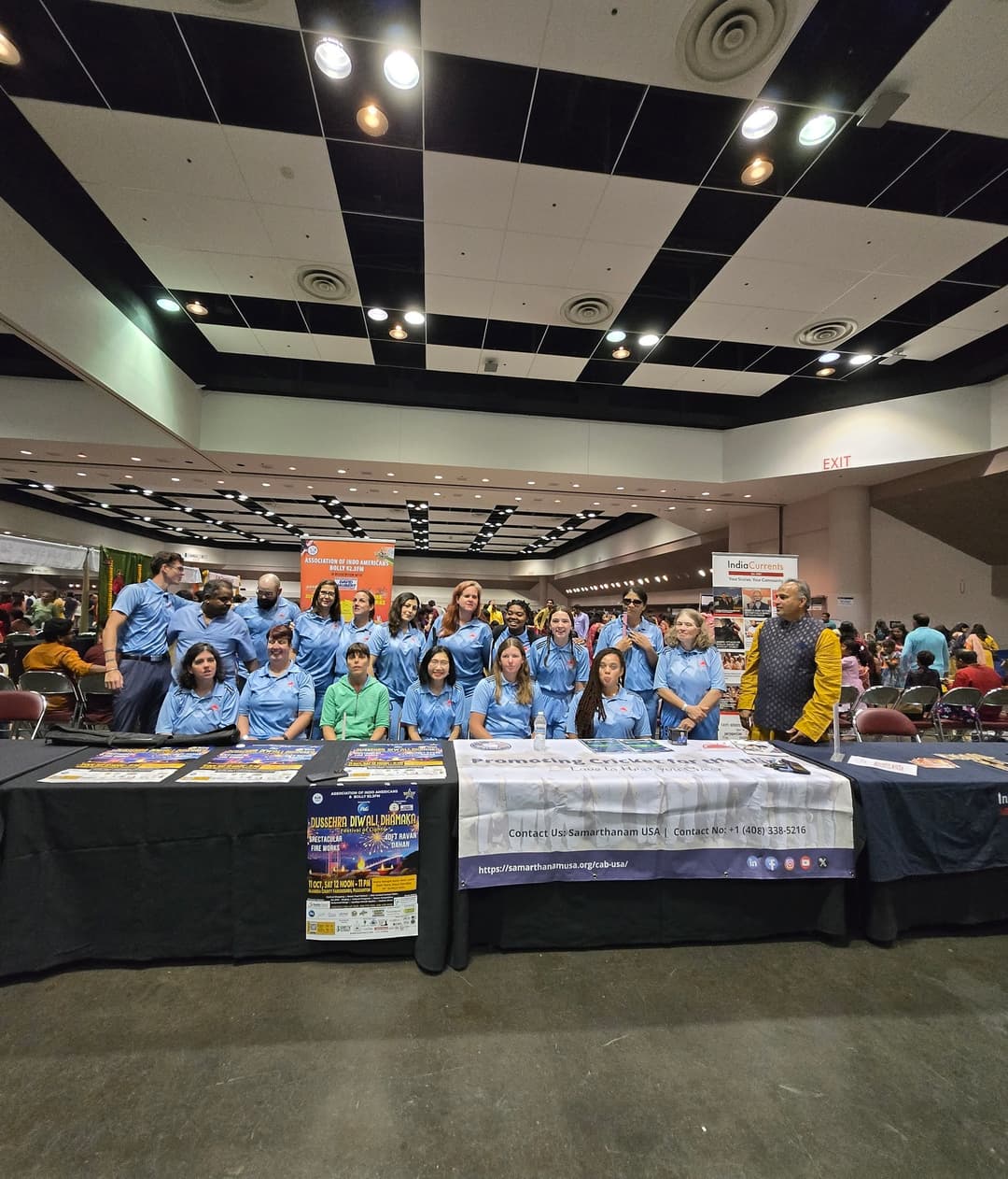 A group photo of the women&#39;s blind cricket team, smiling and enjoying the event.